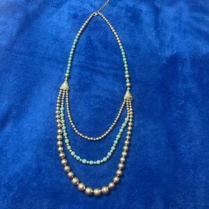 Vintage Boho Silver and turquoise color bead necklace is approx 20 inches.